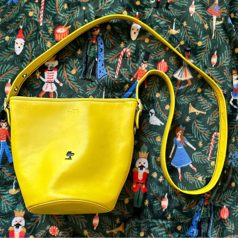 Limited Edition Coach x Peanuts Woodstock Yellow Leather Bucket Bag